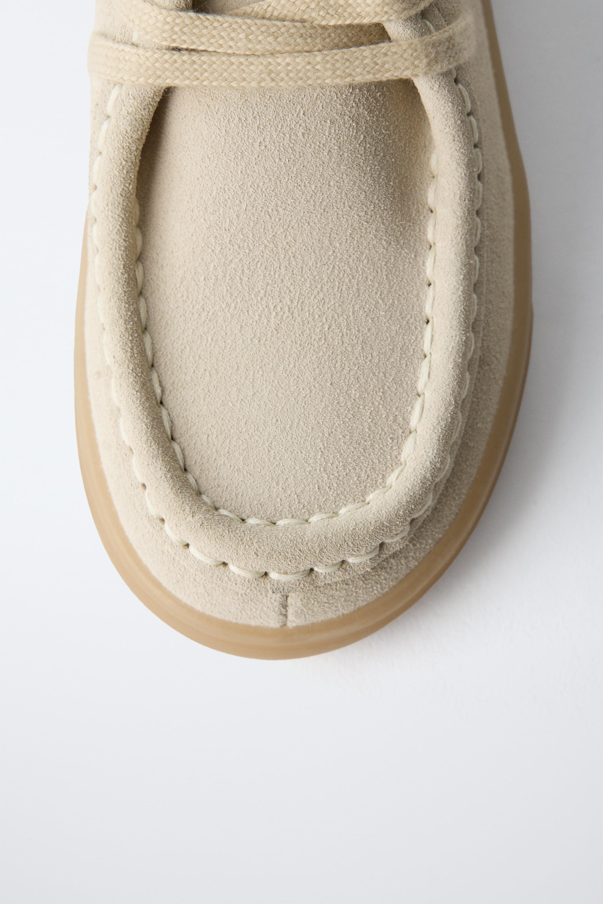 CHAUSSURES À BORD LARGE EN CUIR